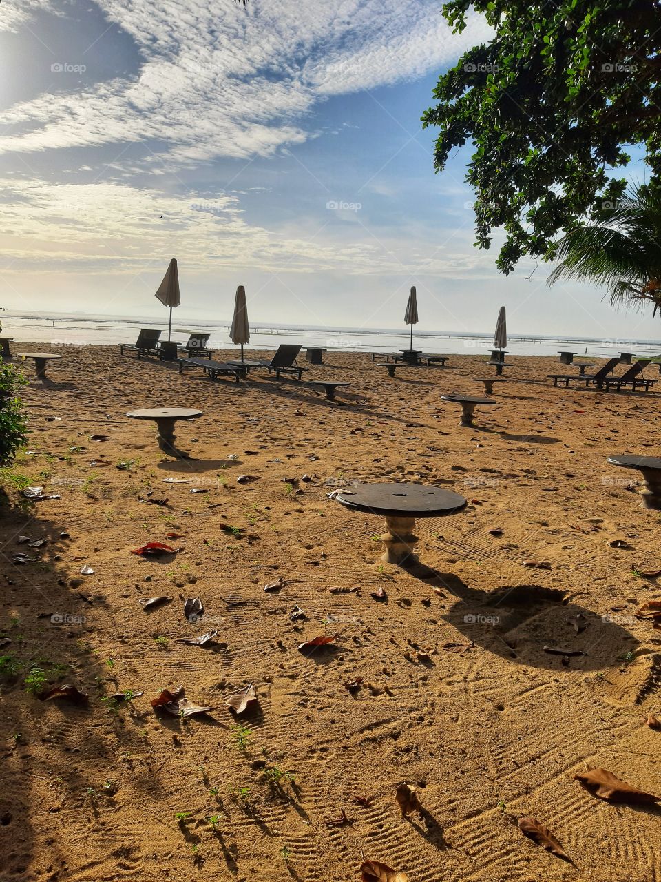 Beach furniture placed on the sand