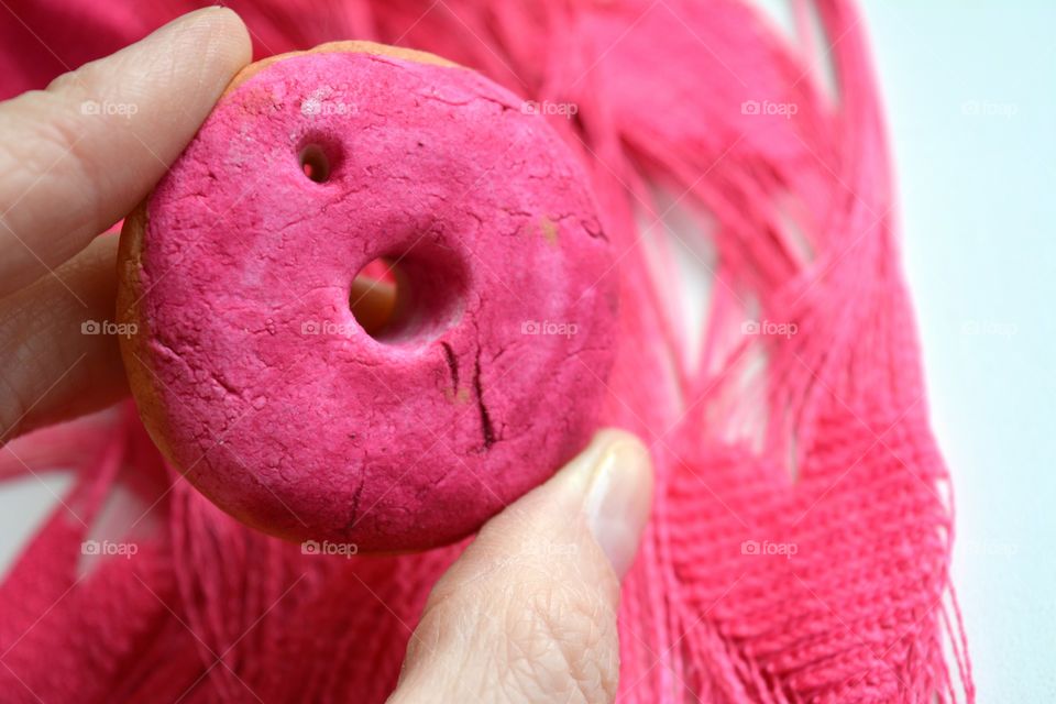 Close-up of a pink donut