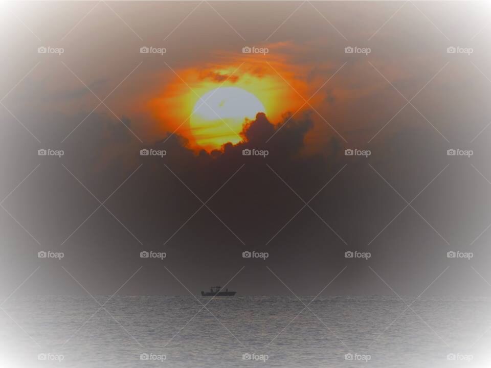 Beach sunrise and boat