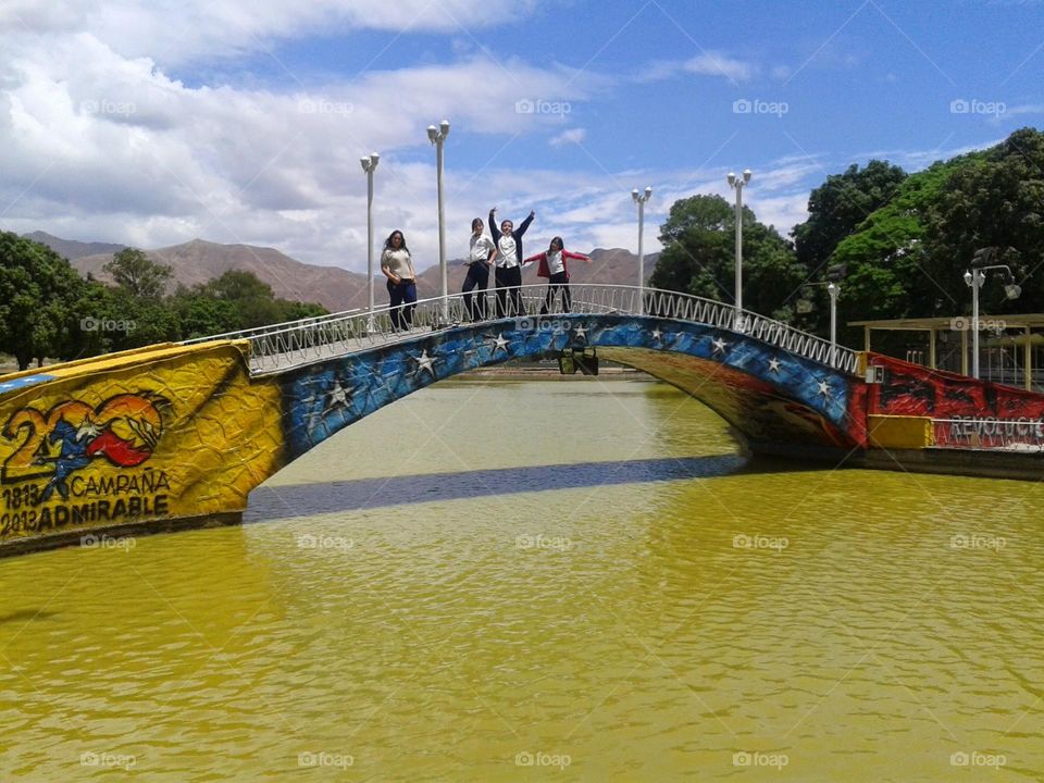 bridge of beautiful colors in the Parque del Circulo Militar, tourist place.  Bandera de Venezuela