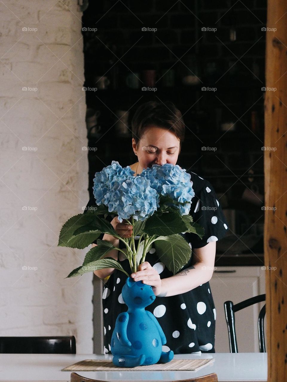 Woman with blue hydrangea 