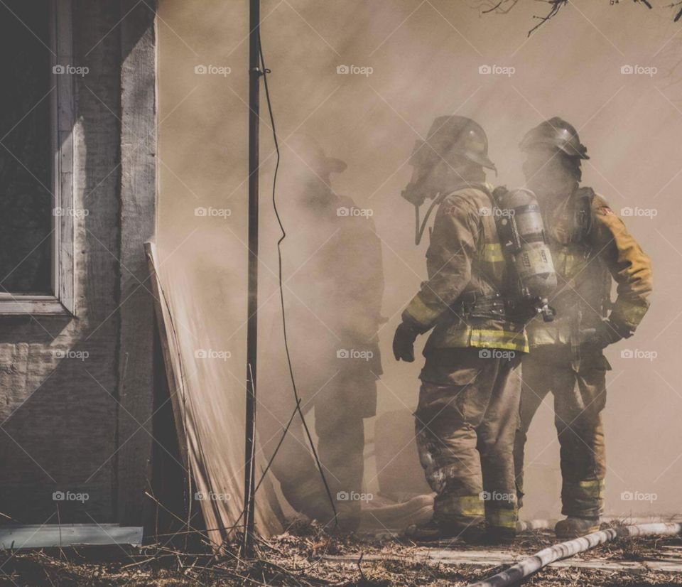 Firefighters In The Smoke