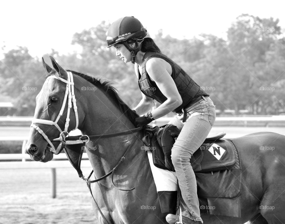 Michele Nehei on Upgrade. Training horses at lovely Saratoga Race Course. Black and white photo of a female horse trainer. 
Zazzle.com/Fleetphoto