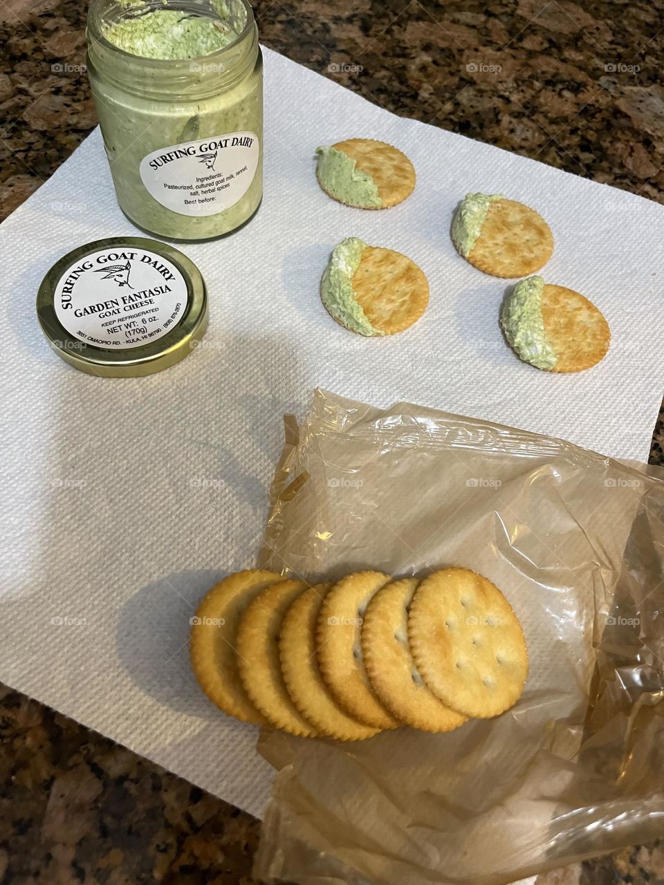 Rows of goat cheese and crackers 