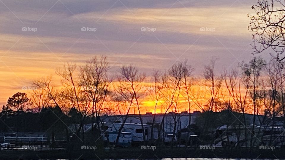 Sundown complete. Evening colors have disappeared blue gray high clouds have taken over the night Sky. 