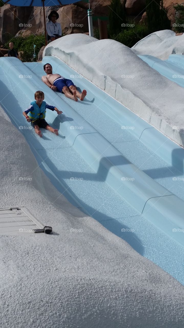 waterslide. father and son waterslide