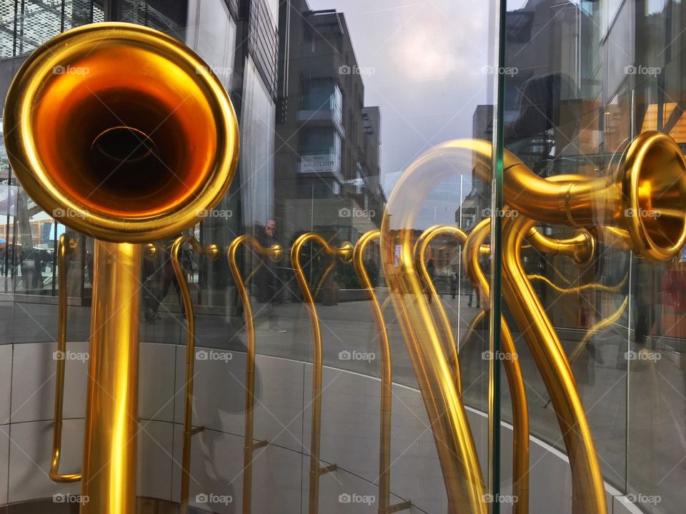 many trumpets side by side