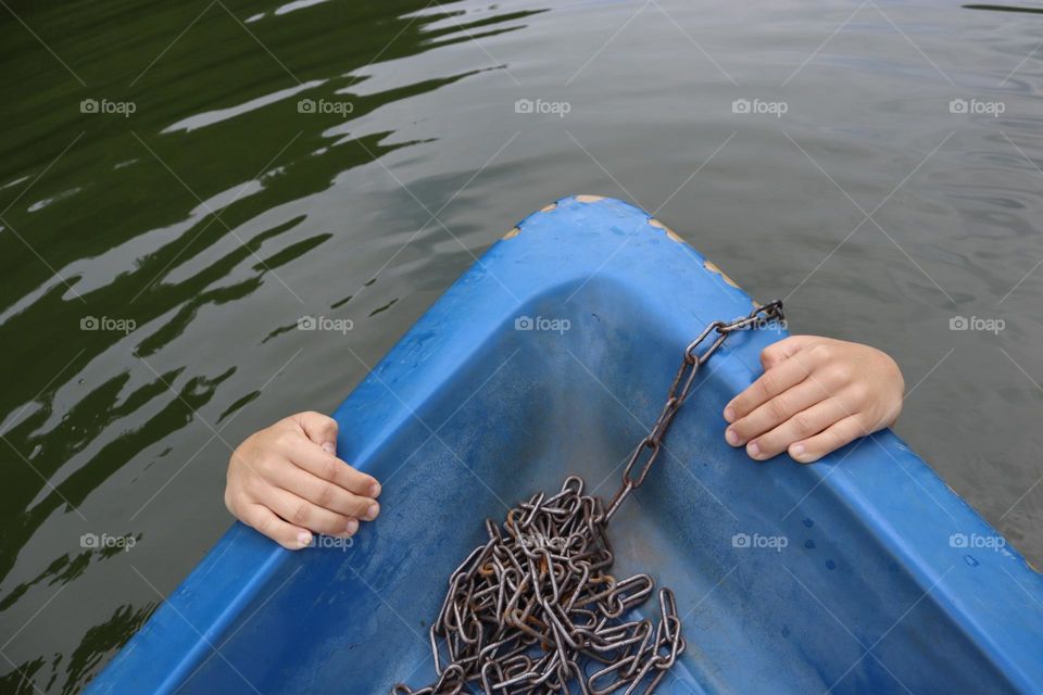 Hanging on Blue boat 