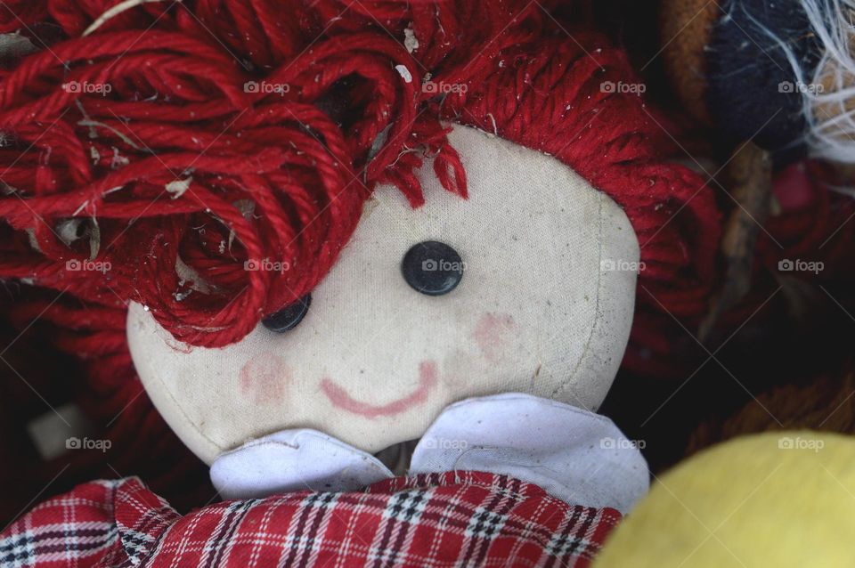 red hair  abandoned doll  toys, fabric doll  doll left on the street  macro photo