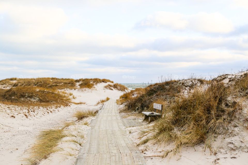 Empty bench at beach