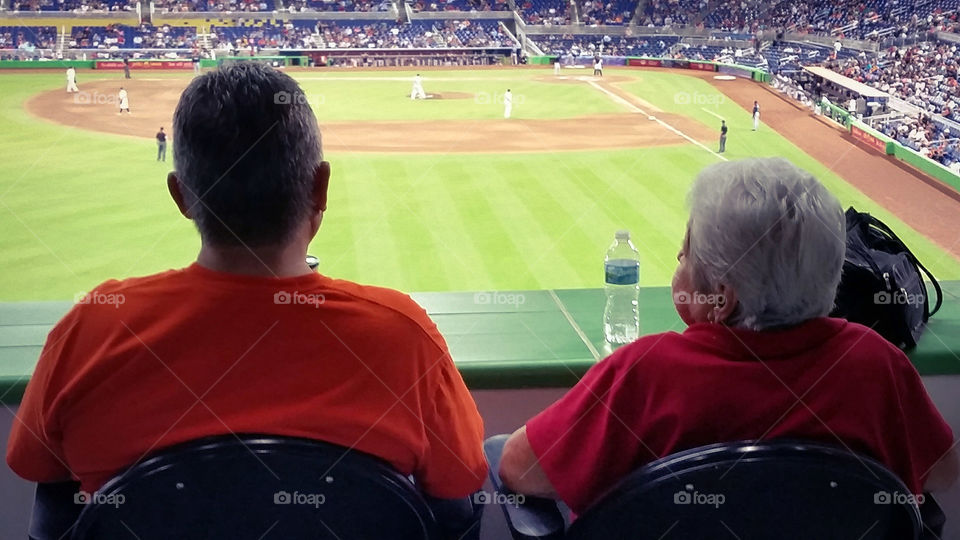 elderly at a game