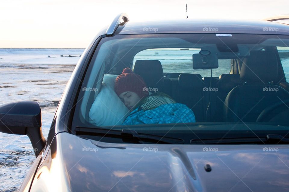 Girl sleeping in car