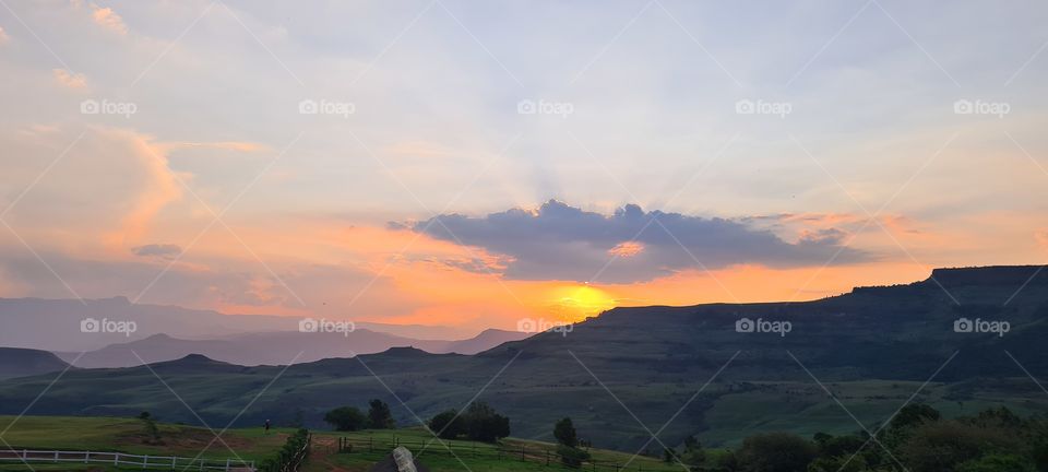 sunset behind the mountain