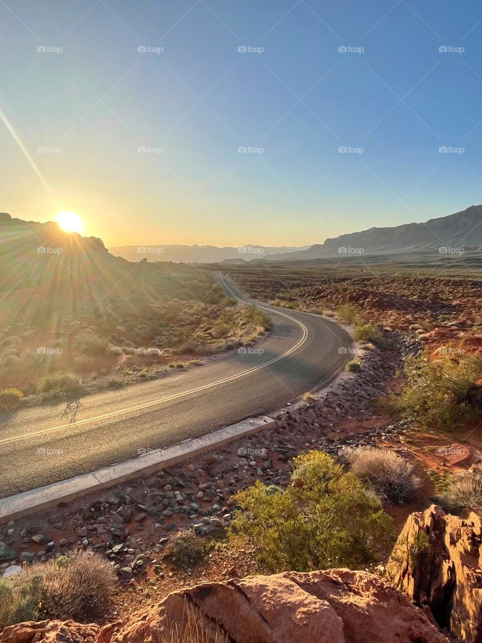 Sunrise over Road and Rocks