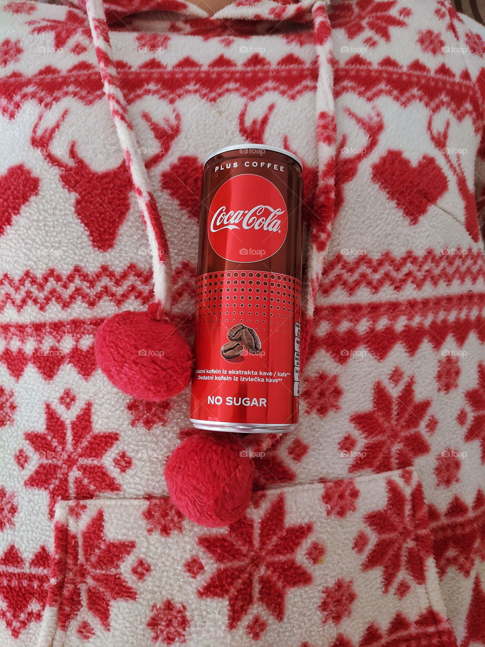 Red can of Coca Cola without sugar close up. Top view.