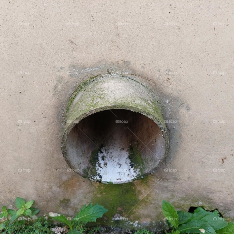 pipe in the wall for water flow