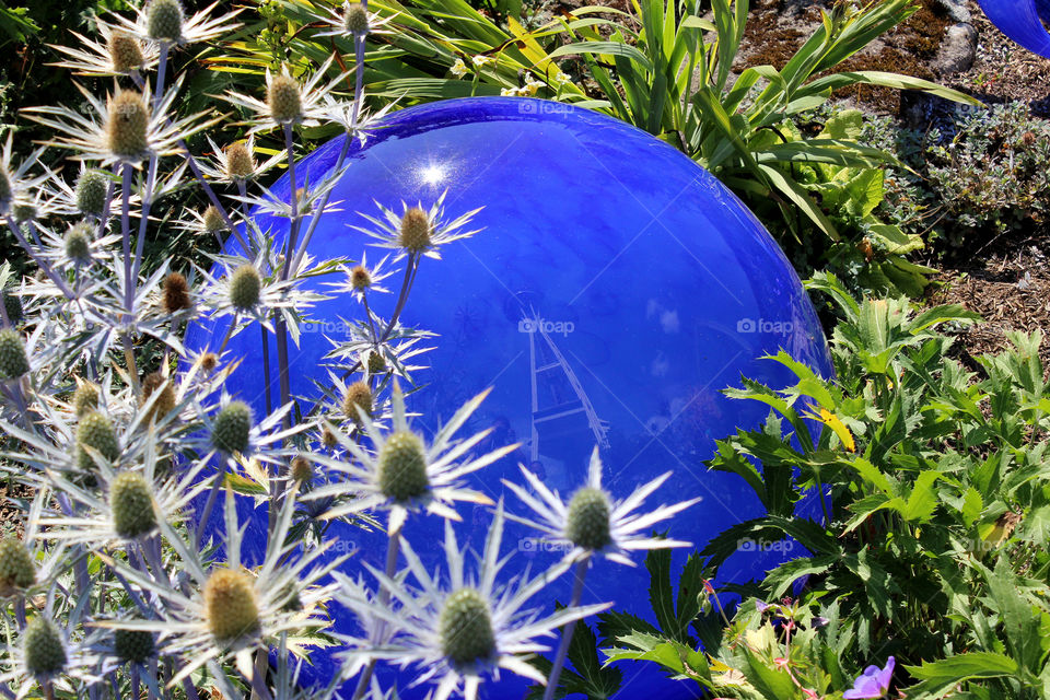 Space Needle reflected in glass at Chihuly Glass and Garden in Seattle