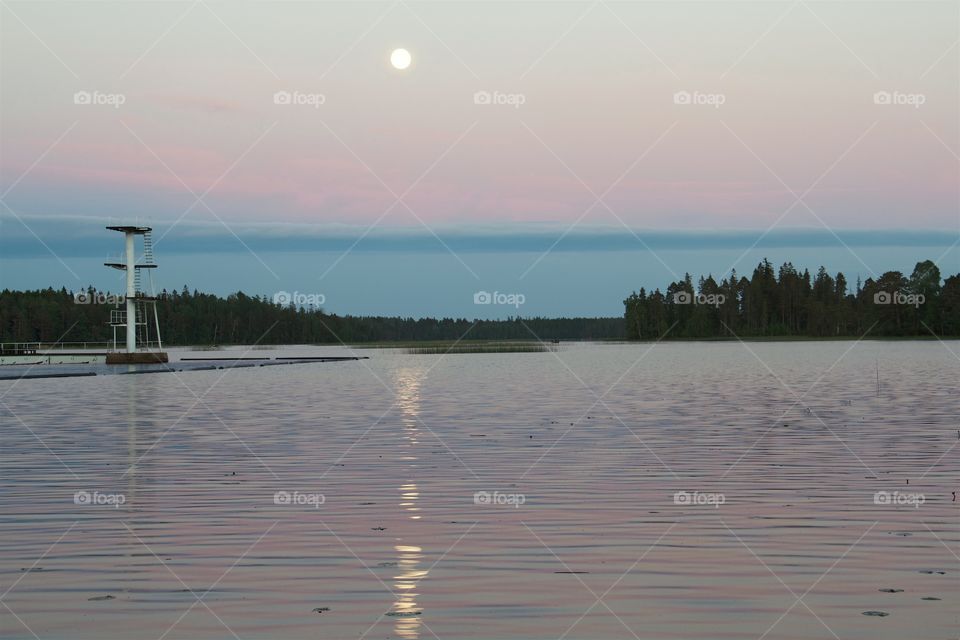 full moon over the water