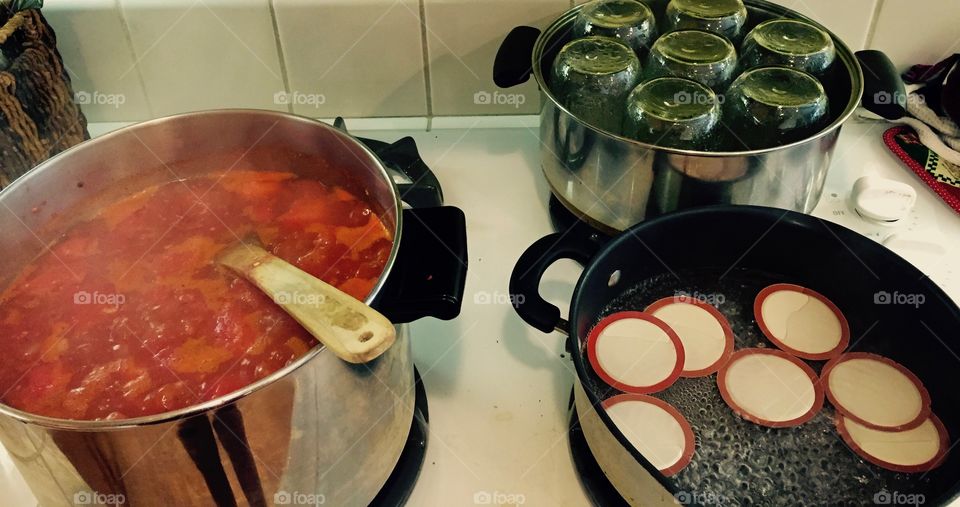 Making tomato sauce for canning
