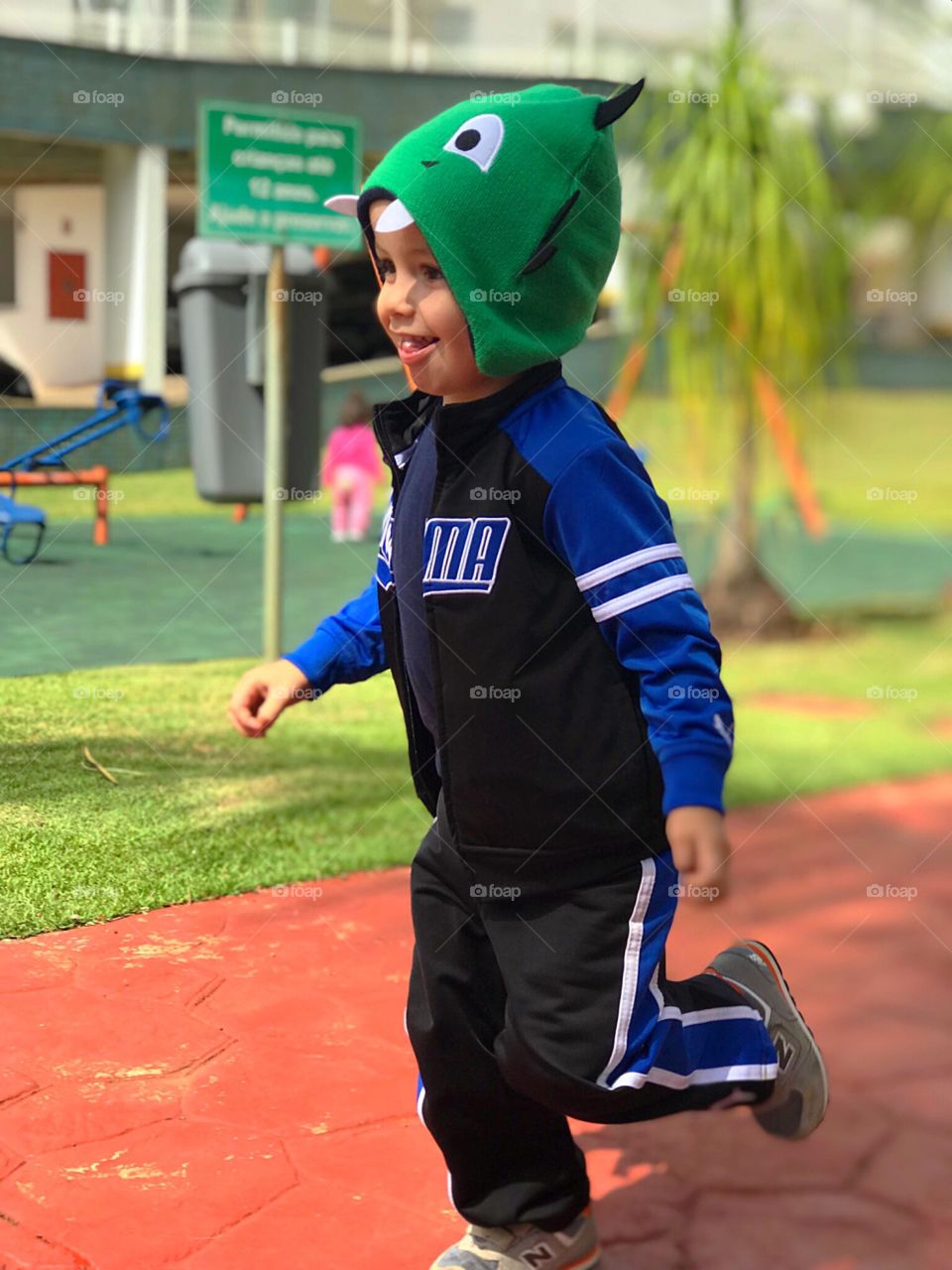 Kid running on the playground 