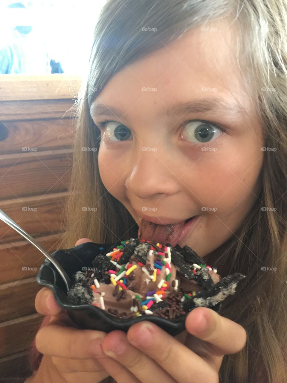 Girl liking ice cream 