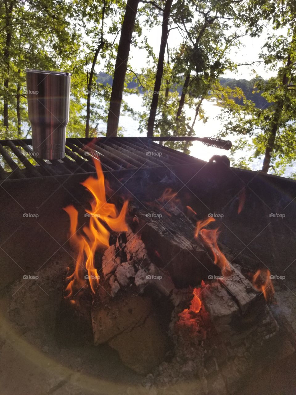 coffee and campfire on the lake.