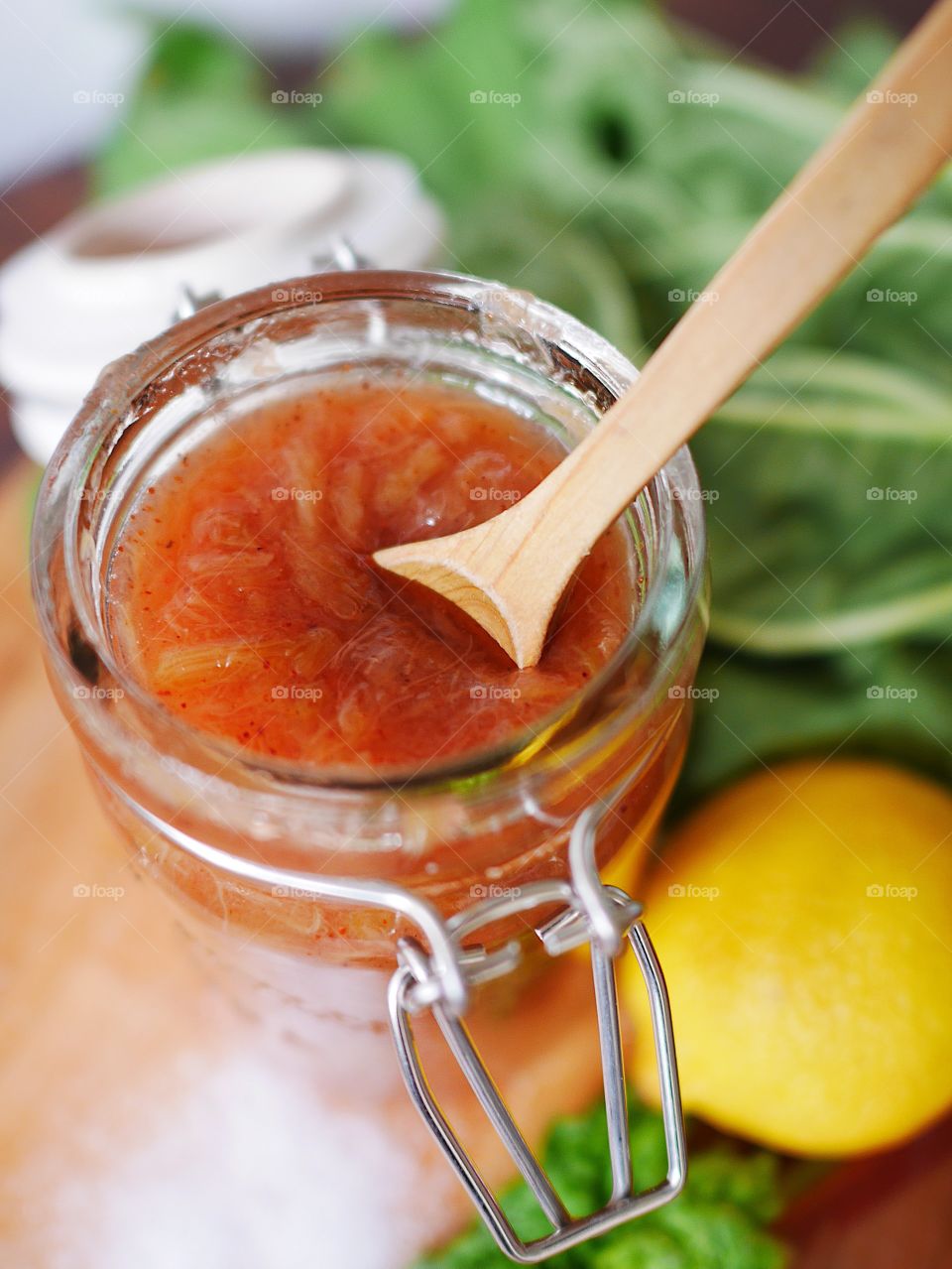 Close-up of pickle jar on table