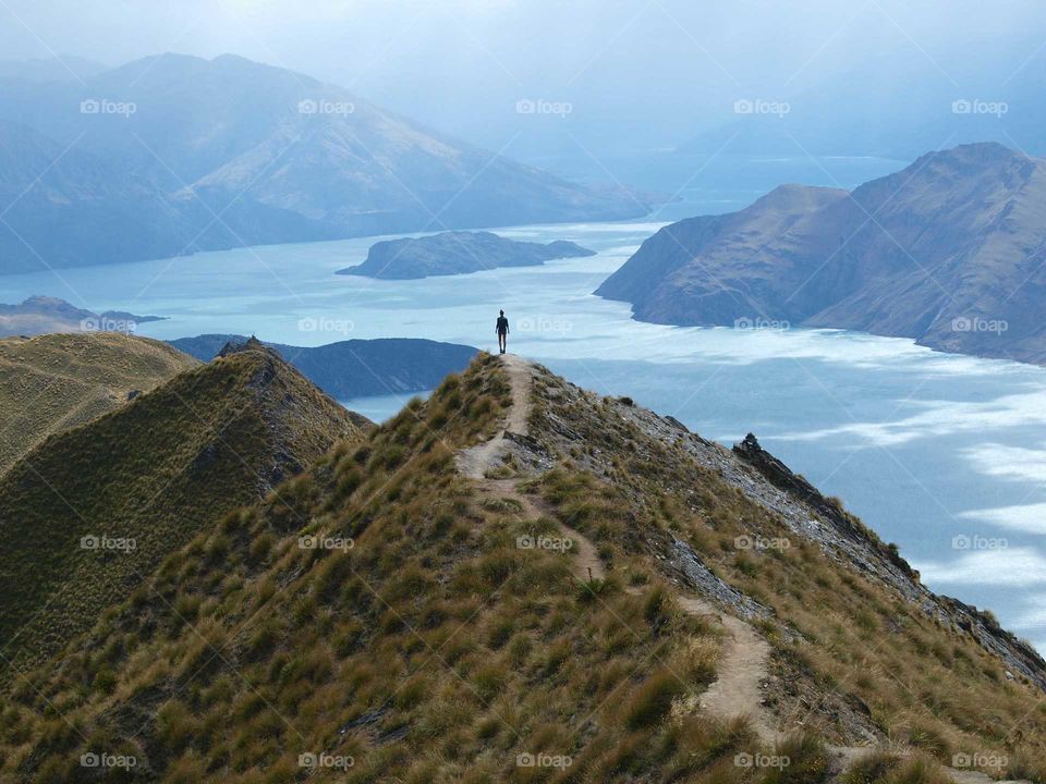 person on top of the Roy's peak track