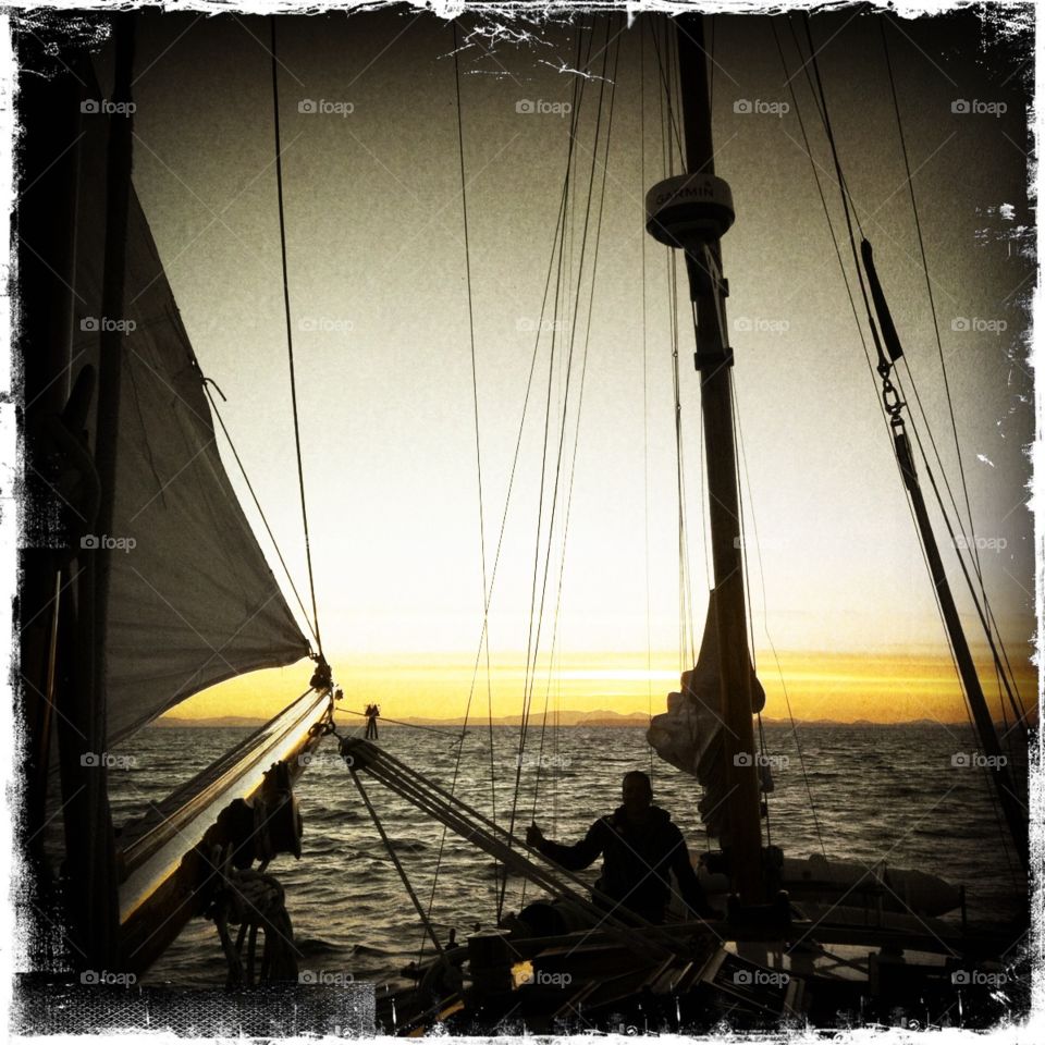 Sail on. Sailing up the Inside Passage. Sunset before a long night at sea. 