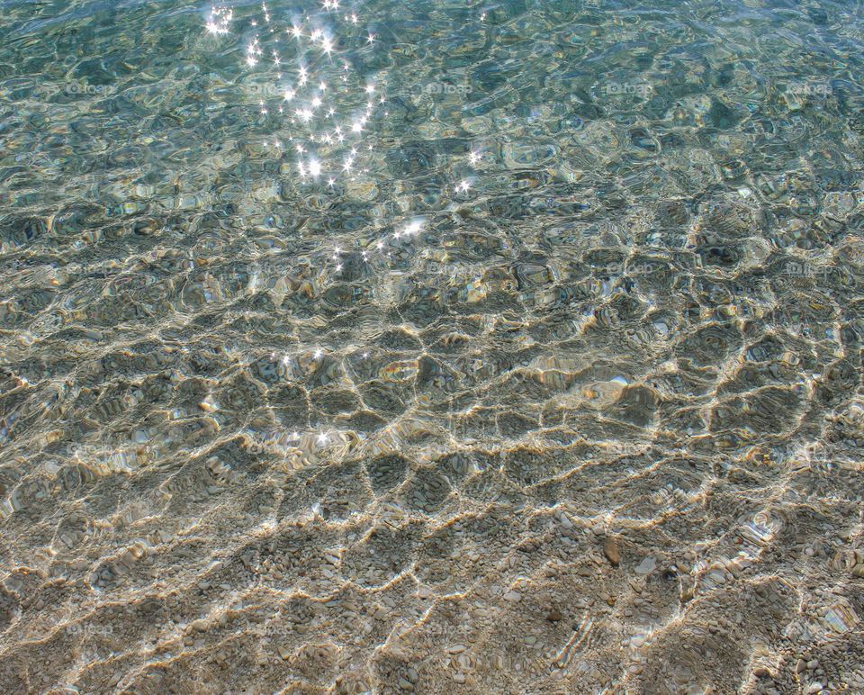 A view from above of the full frame of the sea.  Tranquility scene , sunny light