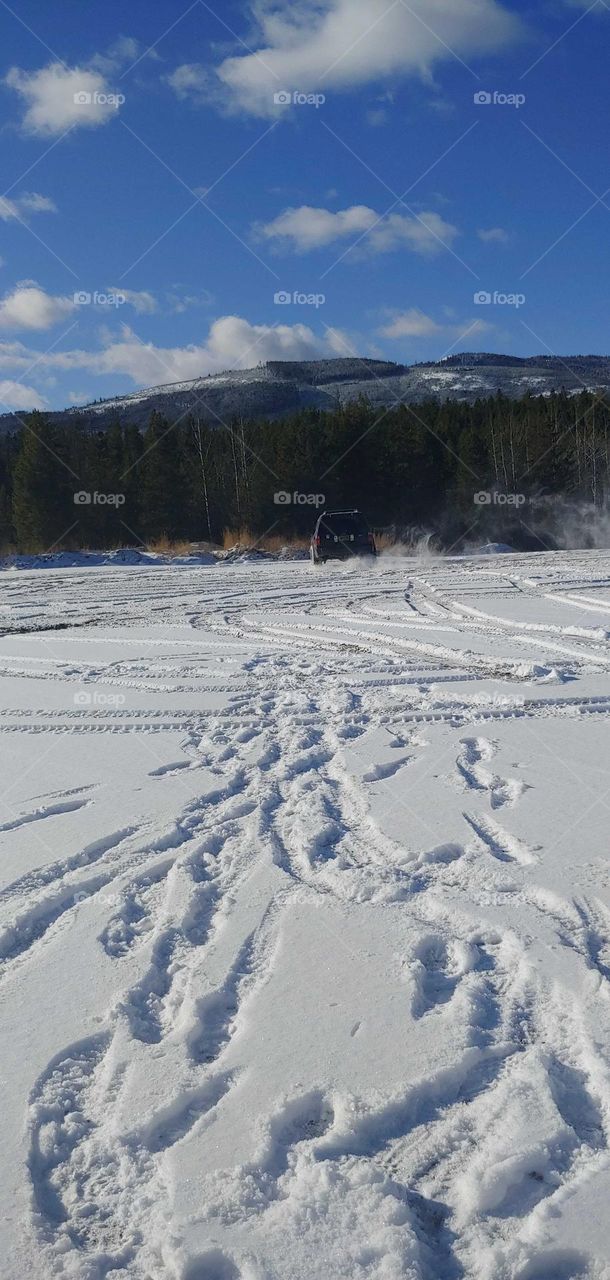 Some fun in the snow up in the mountains .