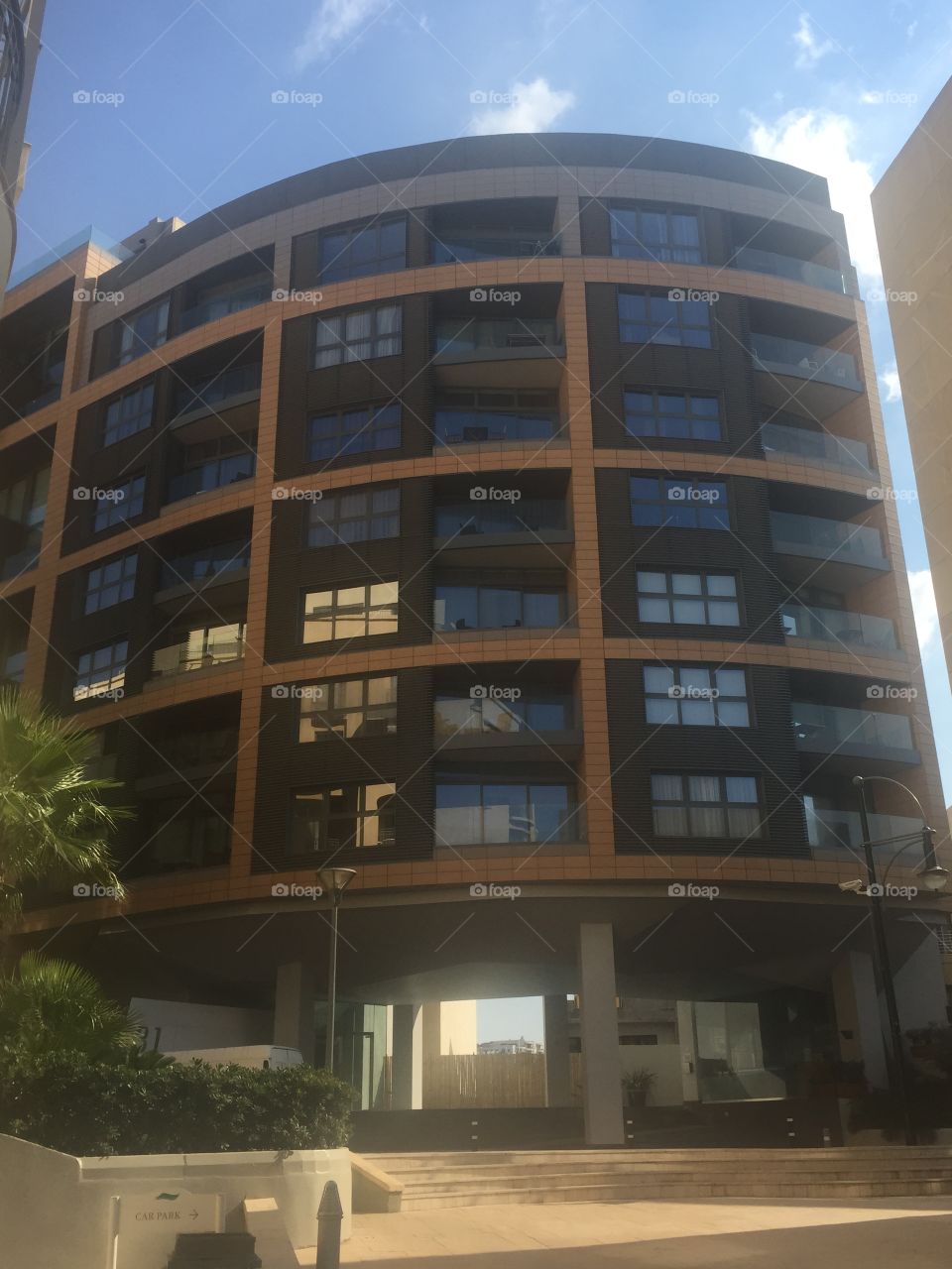 Windows around the world. Many large windows in a contemporary apartment block in Portomaso, San Giljan, Portomaso.