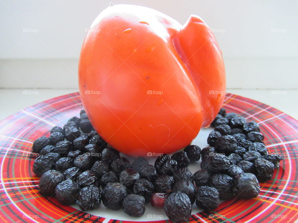 large and small berries, persimmon