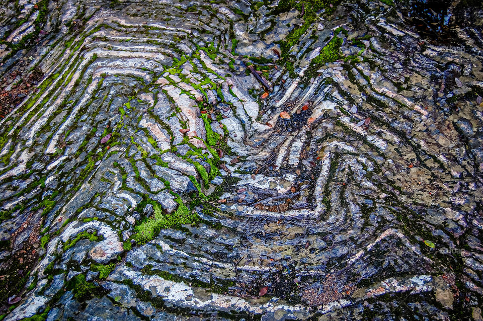 deformed lines in the rock
