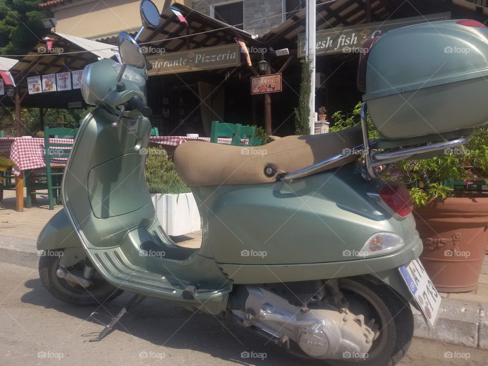 Old green Vespa bike