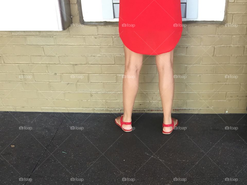 Woman withdrawing money from an ATM