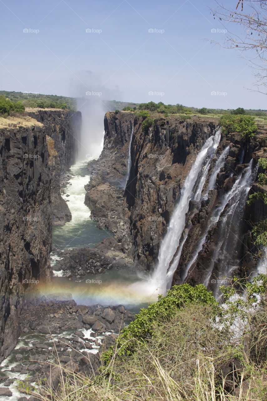 Victoria Falls on the Zambezi River. Locally known as “Mosi-oa-Tunya” (The Smoke that Thunders).