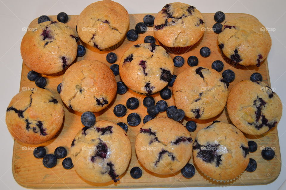 Blueberry Muffins on wood