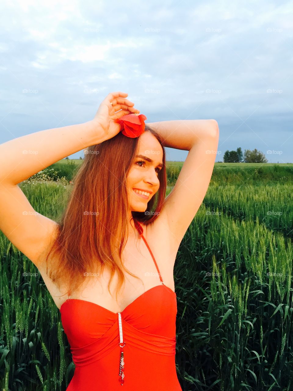 Beautiful woman standing in field