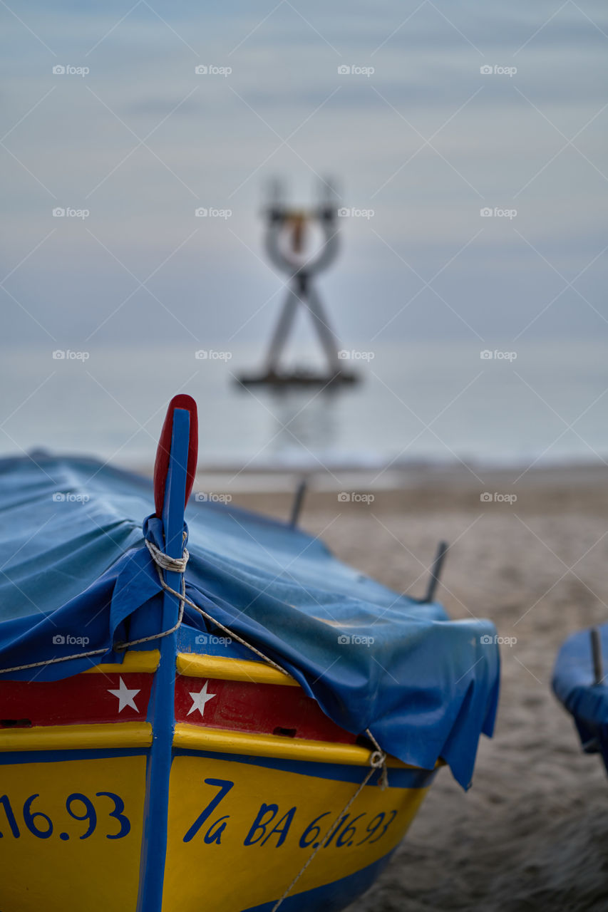 Boat at the beach in a winter day