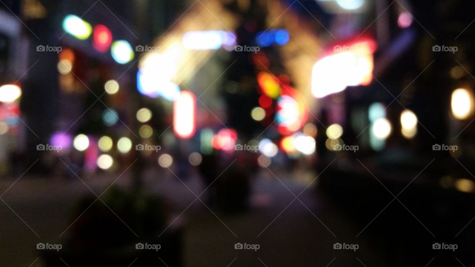 night abstract blur urban city background dark colorful lights nightlife fun exciting entertainment happy