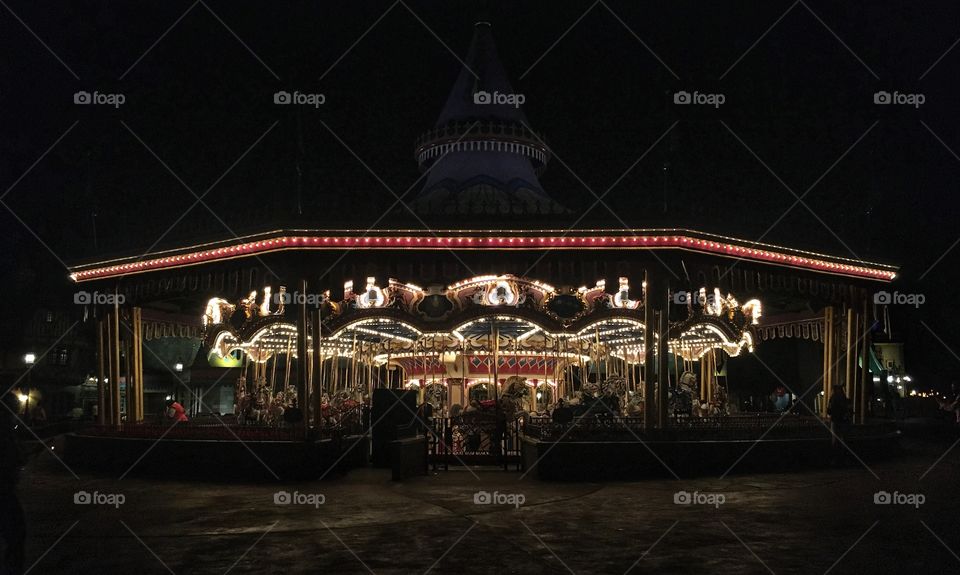 Who needs sleep when you can play on a merry-go-round 