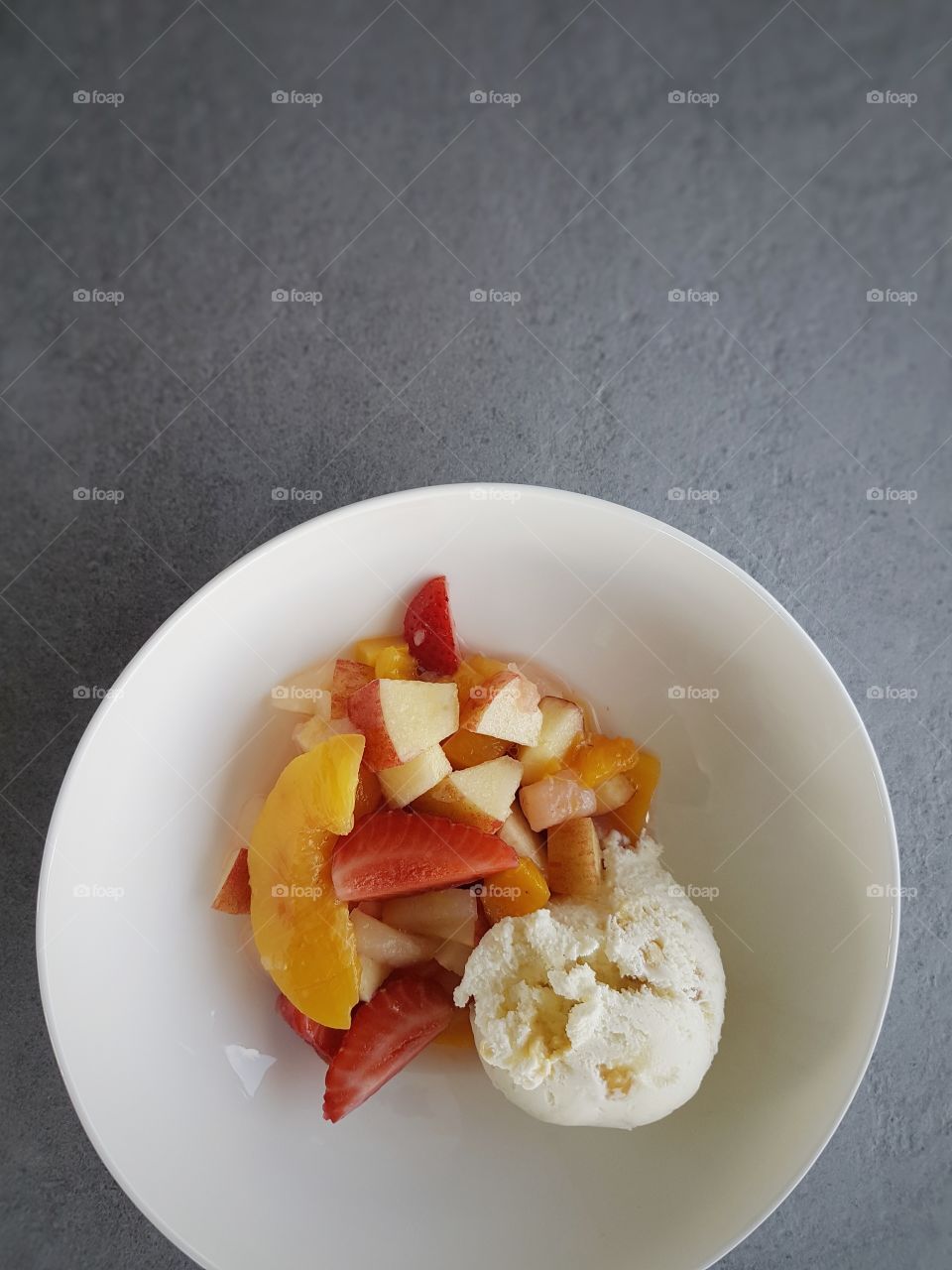 bowl of summer fruit salads and icecream