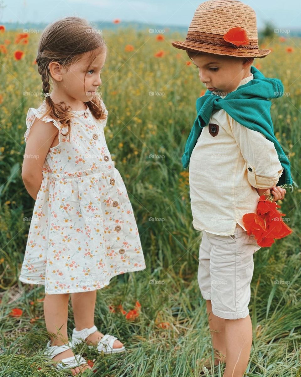 Sad toddler and a beautiful girl