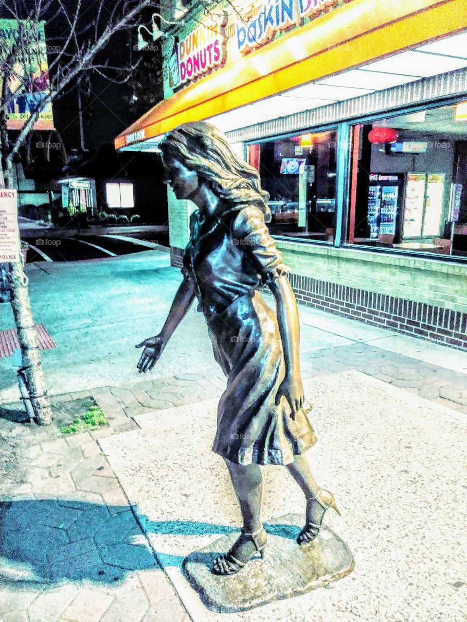 another bronze statue this one young woman on Broadway in Bayonne N.J.