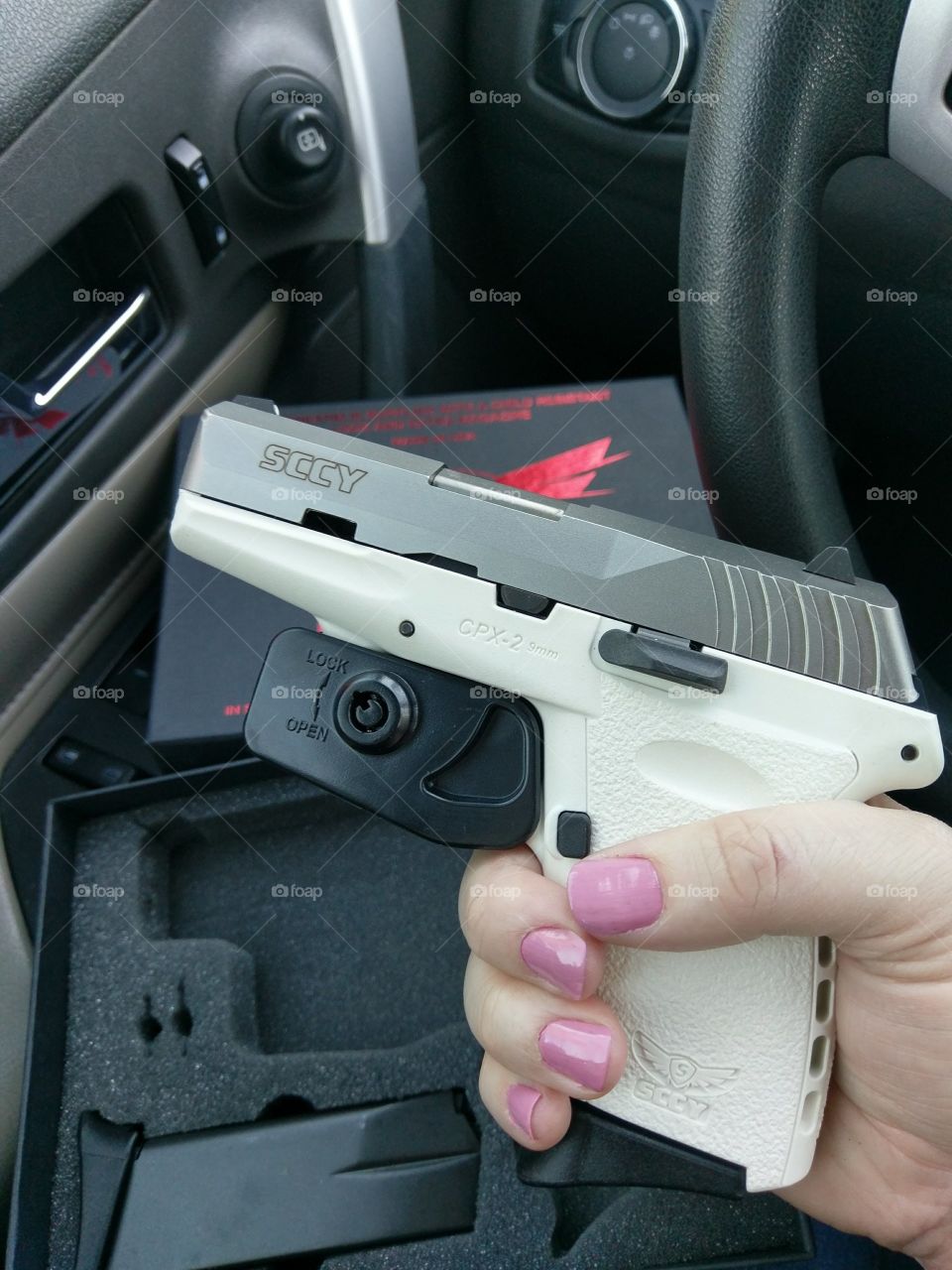 unboxing the white SCCY 9mm