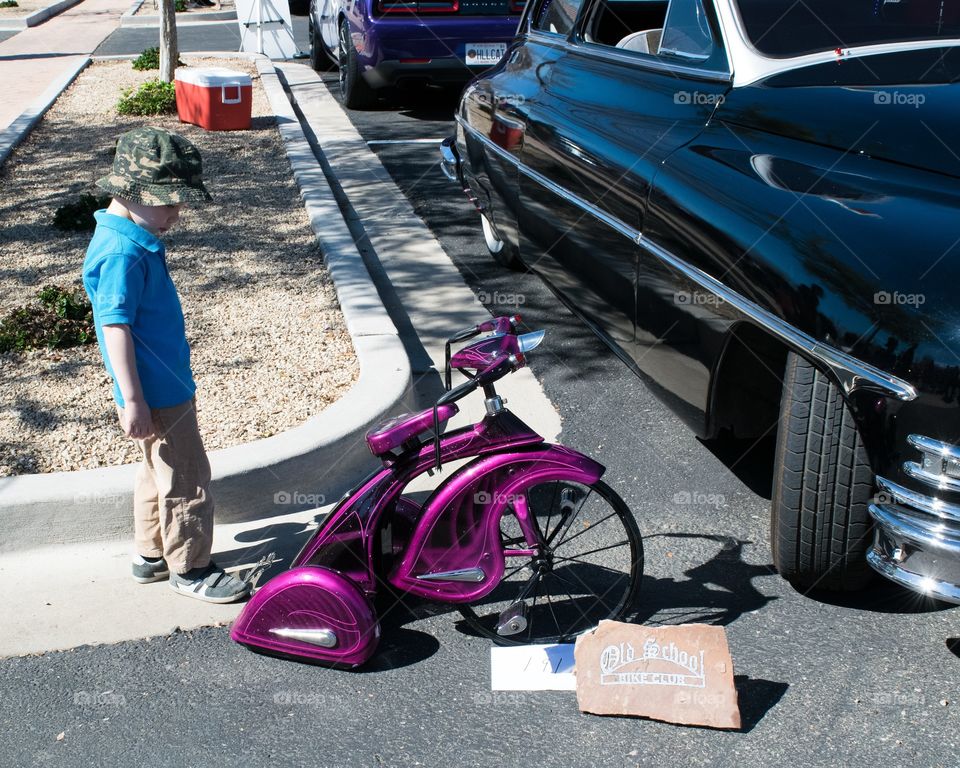 Boy looking at classic trike