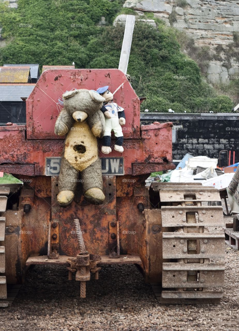 Disintegrating soft toys are mascots on this well used caterpillar marine engine