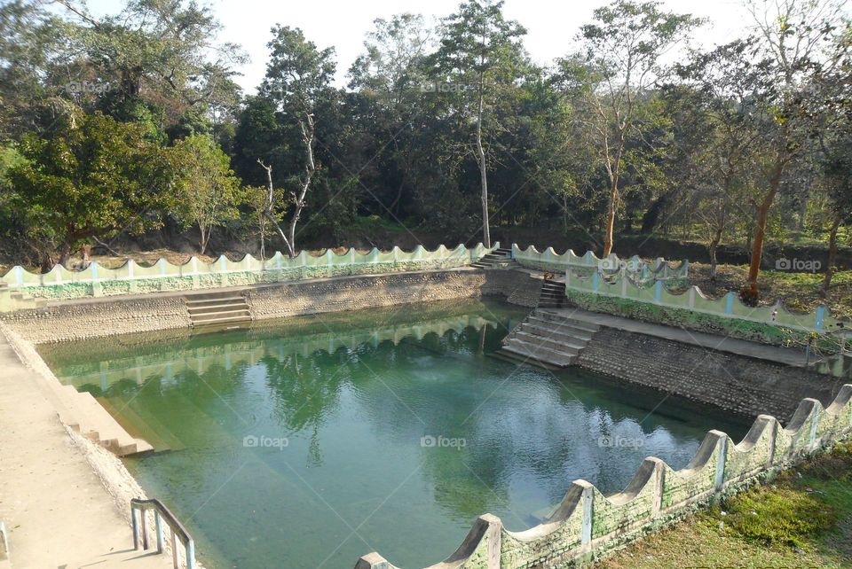 a hot water spring in golaghat district, assam, india.