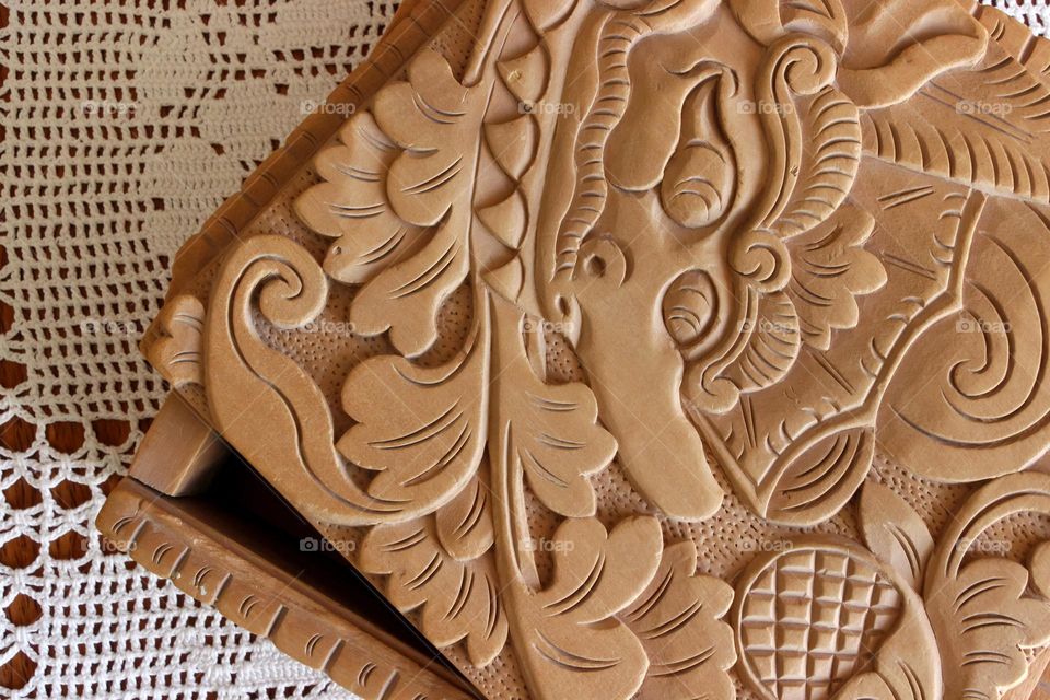 Carved lid of wooden box